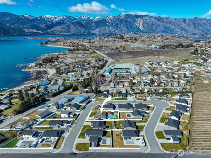 Aerial showing proximity to public boat launch and downtown Manson, WA amenities.