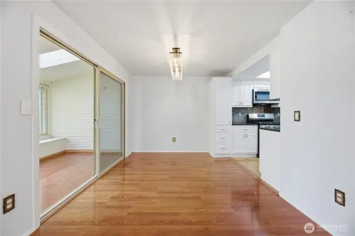 Dining Area with enclosed Sun Deck on your left.