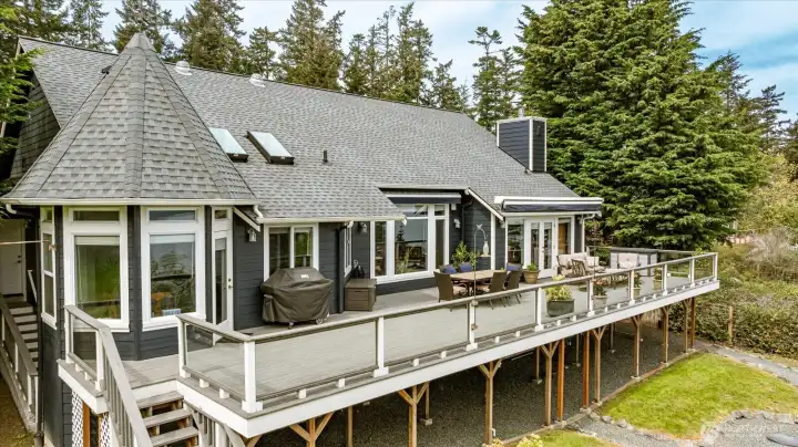Single floor living is supplemented by a full basement with storage, workshop, bathroom, and sauna!