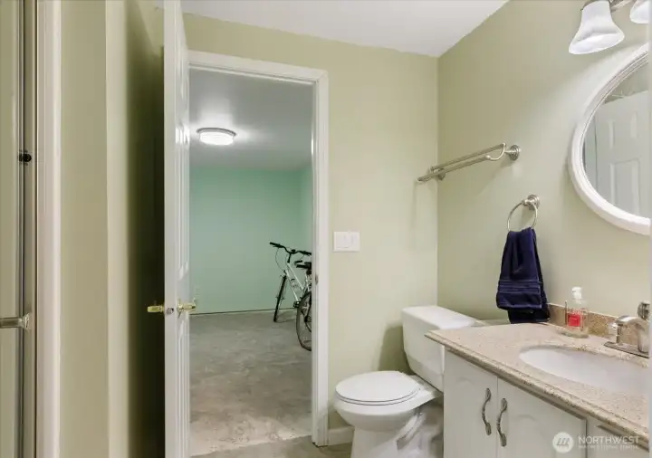 Basement 3/4 bath connected to adjoining room.