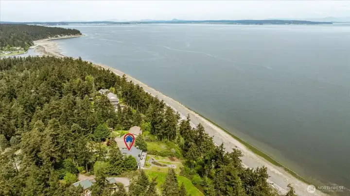 Aerial view of property and beach, looking north