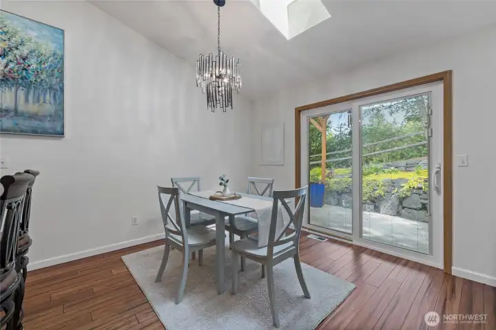 High ceilings enlarge the space with entry to patio High ceilings enlarge the space with entry to patio