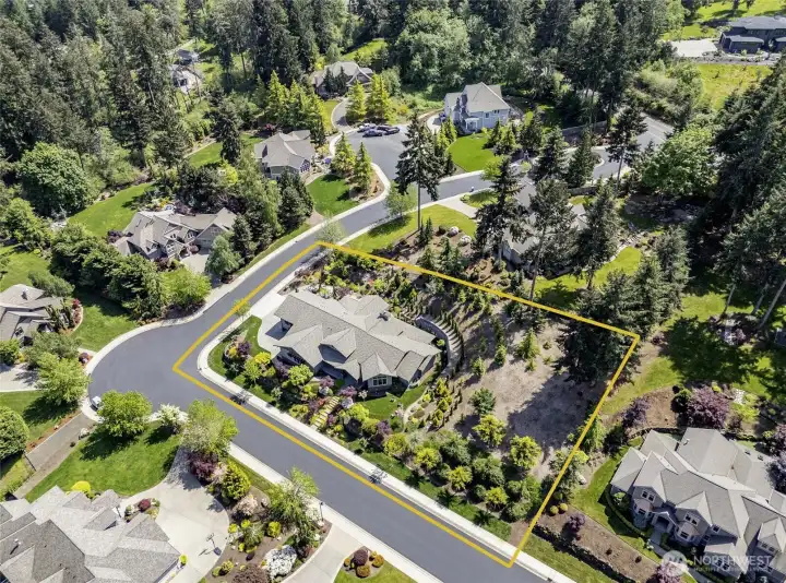 Corner-lot perfection. This is the kind of home people slow down to admire.