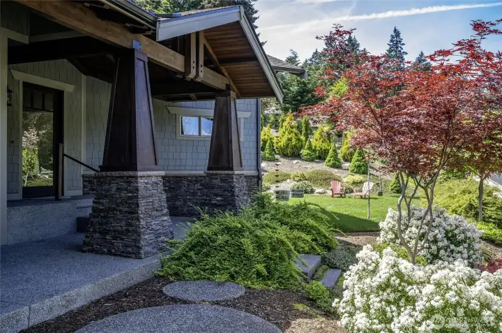 The entry is crafted to impress — rich natural textures designed to captivate on arrival.