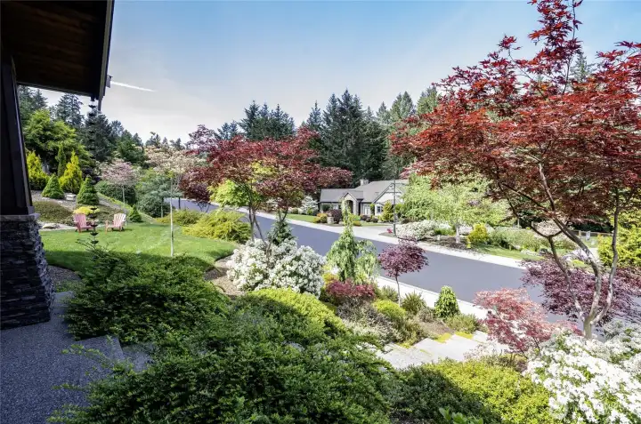 Elegance begins at the curb. Storybook landscaping creates a retreat of beauty and calm.