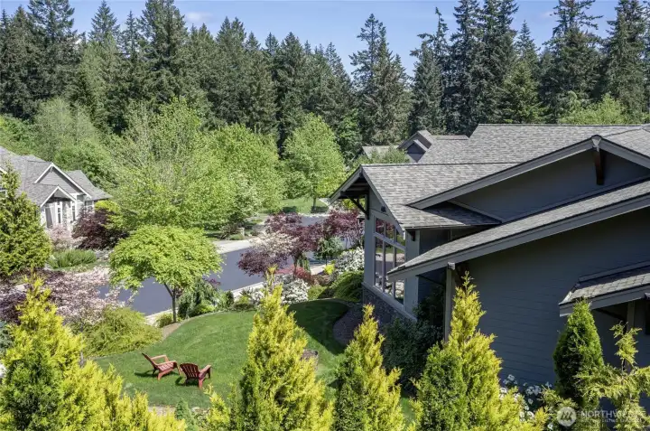 Bathed in natural light. Where expansive windows and stunning manicured gardens meet the ultimate in quiet neighborhood privacy.