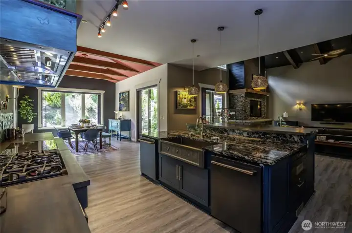 A gourmet chef’s dream kitchen designed for ultimate entertaining. This spectacular culinary space centers around an expansive island before flowing seamlessly into a scenic dining alcove and a soaring great room.