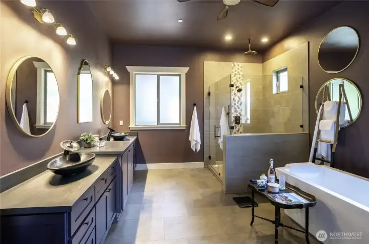 Why book a luxury resort? Experience ultimate luxury right at home. This en suite features a massive walk-in rainfall shower. The crown jewel: an extra-long, insulated freestanding soaking tub for two that keeps the water perfectly hot for hours.