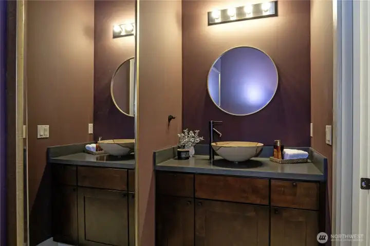 This stylish guest bathroom delivers an immediate wow-factor and a memorable, upscale experience for your guests.