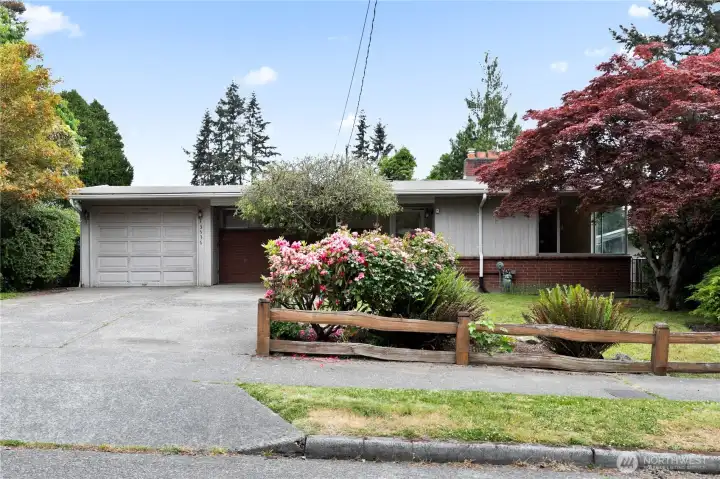 Home is nicely set back from the street, and has mature foliage and a split rail fence for curb appeal. Home is nicely set back from the street, and has mature foliage and a split rail fence for curb appeal.