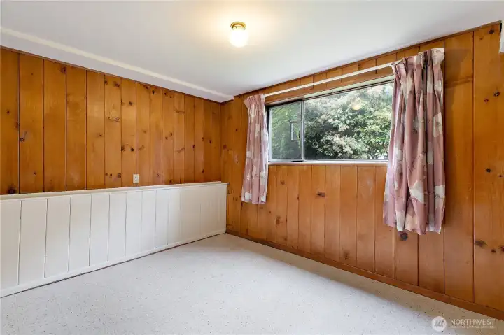 Bedrooms feature beautiful period wood paneling Bedrooms feature beautiful period wood paneling