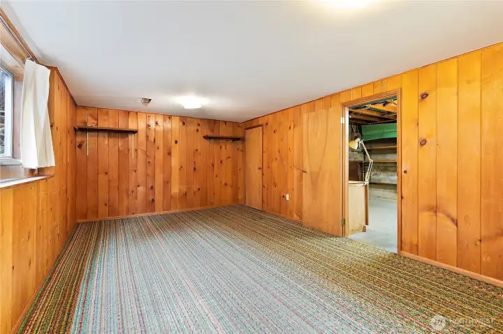 The wood paneled basement bedroom. The wood paneled basement bedroom.