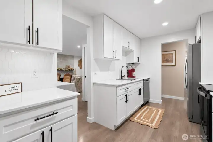 Kitchen – Functional workspace with generous storage and prep areas. Kitchen – Functional workspace with generous storage and prep areas.