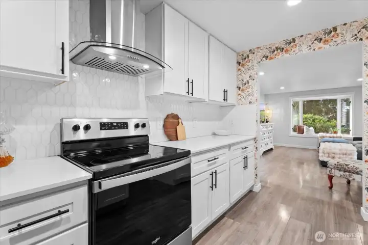 Kitchen – Updated kitchen featuring modern finishes and ample cabinetry.