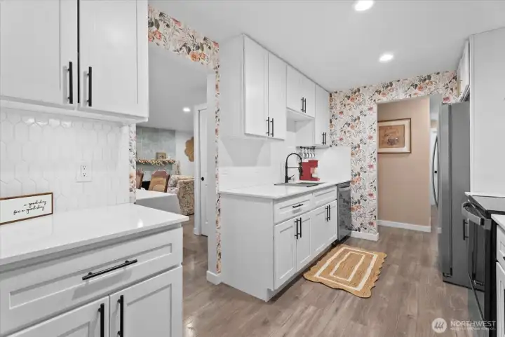 Kitchen – Functional workspace with generous storage and prep areas.