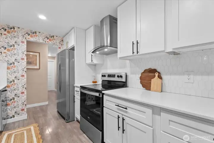 Kitchen has under cabinet lighting.