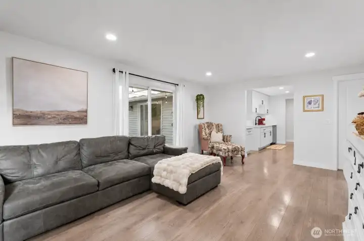 Comfortable family room perfect for movie nights, game days, and spending time together. Comfortable family room perfect for movie nights, game days, and spending time together.