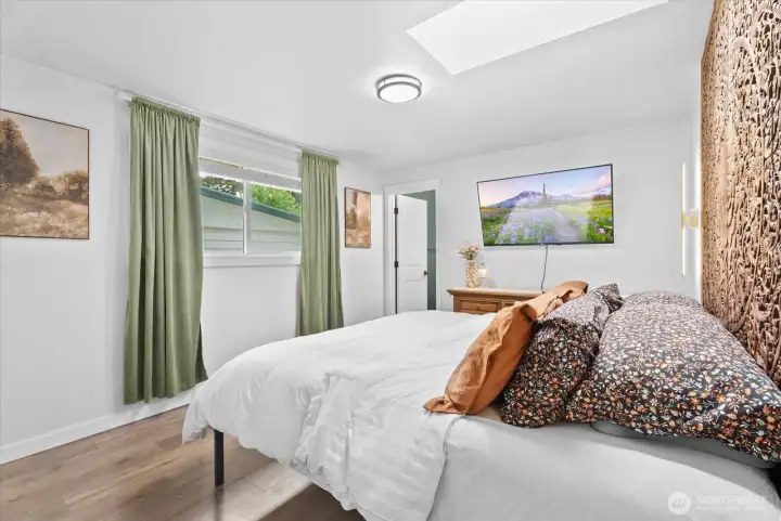Primary Bedroom – Comfortable owner's suite with plenty of natural light.