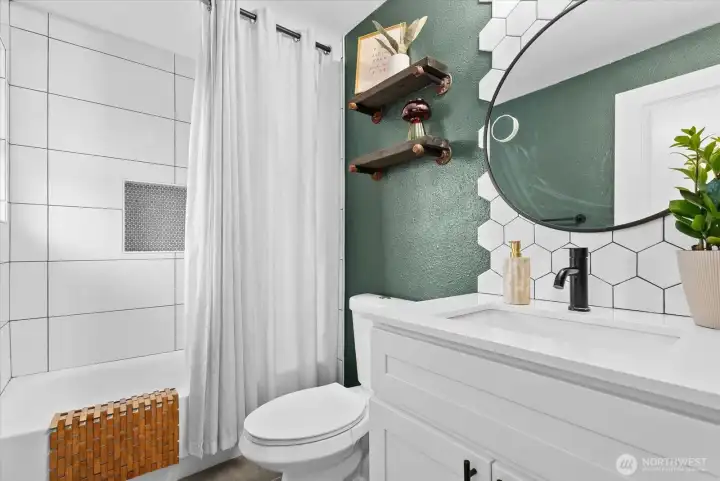 Primary Bathroom – Private bath serving the primary suite.