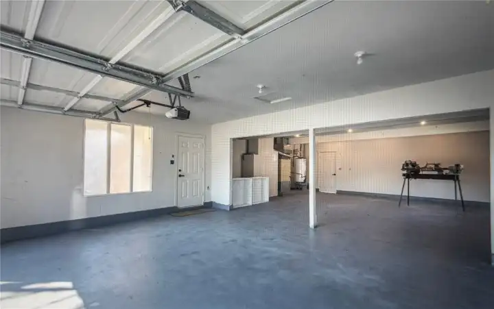 Massive 920 square foot garage with porch & back yard entrances. Massive 920 square foot garage with porch & back yard entrances.