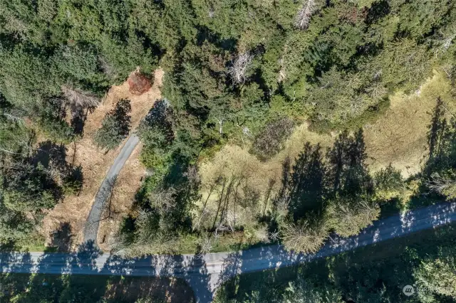 Pond on Right Side of lower property with High Haro Rd off of West Side Rd.