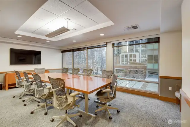 Conference room (South Tower, 2nd Floor)including table, projector w/HDMI & VGA monitor port cables.