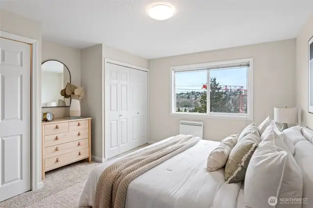 A spacious bedroom providing a peaceful sanctuary, complete with generous closet space.