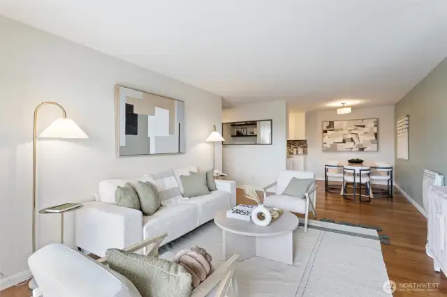 As you step inside, you’ll be greeted by an inviting  floor plan with updated kitchen and a cozy living/dining area.