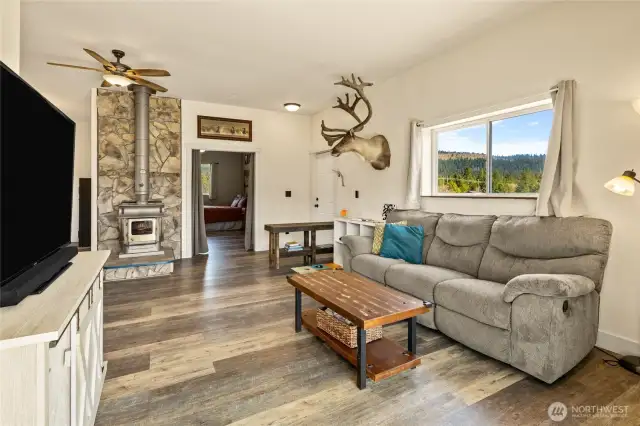 Cozy living space with wood stove.