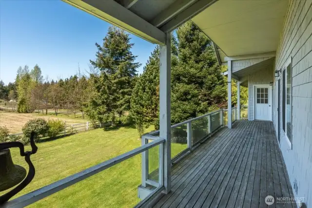 Deck can be access from the main floor living space or the main floor primary bedroom.
