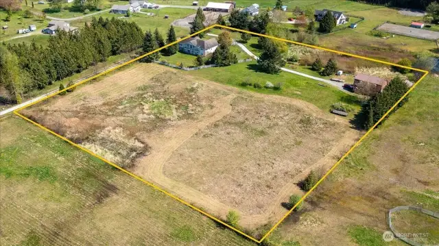 The property lines are approximate. There is also a portion on the right side of the shared driveway that is part of the property.