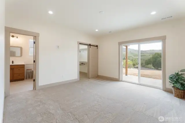 primary bedroom with 6' slider to covered rear patio