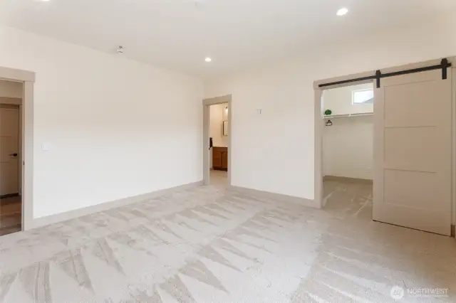 spacious wardrobe closet in primary