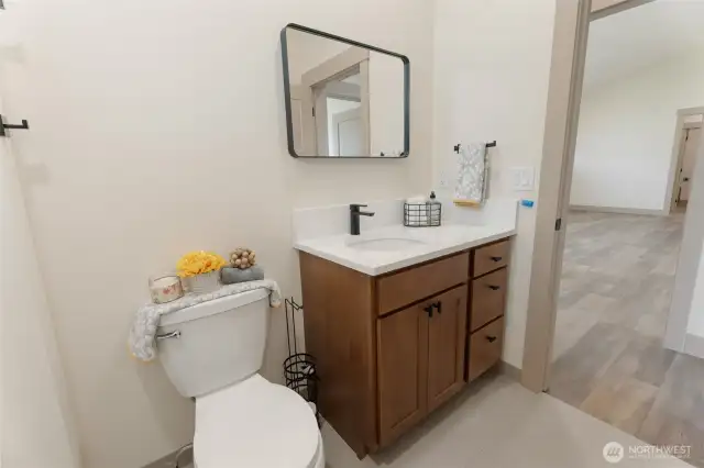 ceramic tile flooring in bathroom between bedroom 1 and 2