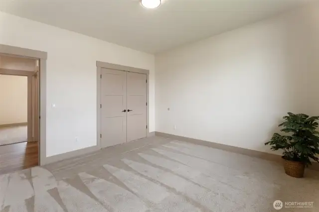bedroom 2 in front of home with wardrobe closet