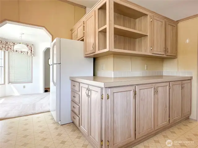 L shaped kitchen with so much storage space, and breakfast room.
