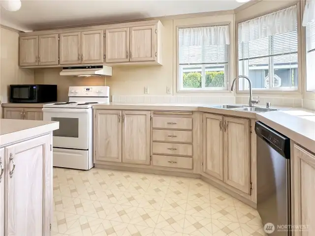 L shaped kitchen with so much storage space!
