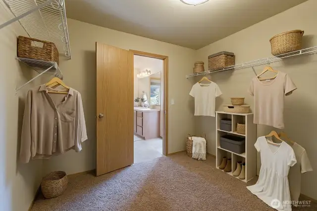 Master bedroom walk in closet Virtually Staged