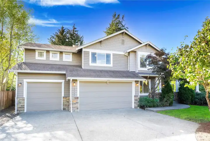 Welcome Home – Beautiful Kenmore residence with timeless curb appeal and a three-car garage.