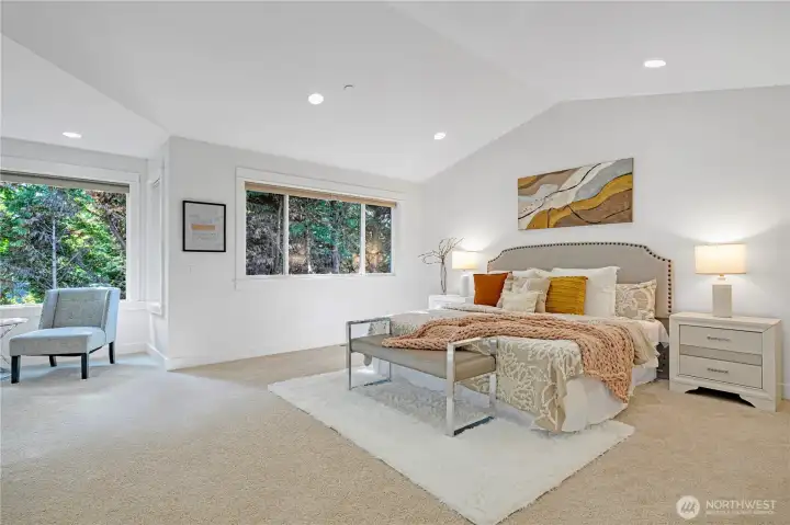 Primary suite, Peaceful retreat with vaulted ceiling and generous space.