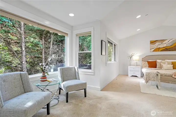Sunlit and serene with room for a sitting area.