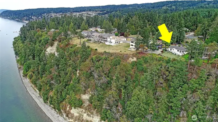 Property stretches to the shoreline, offering a rare opportunity for true waterfront ownership.
