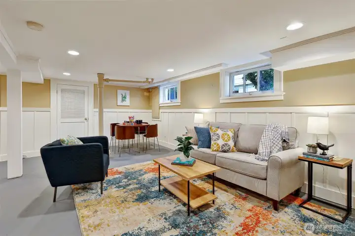 Wainscoting & designer paint make this an inviting space for your rec room, hobbies, home business, or guests.