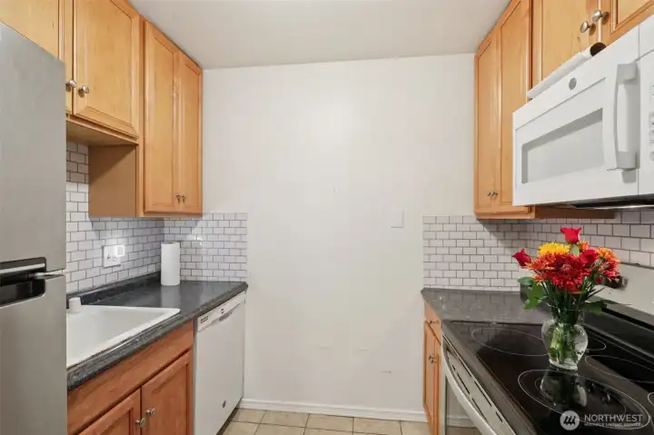 Kitchen with Stove, Microwave and Refrigerator