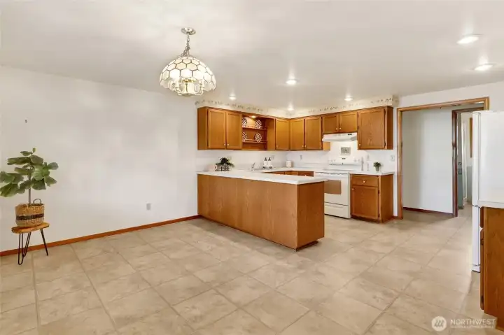 This classic traditional kitchen opens to a spacious dining room—perfect for everyday living and entertaining.