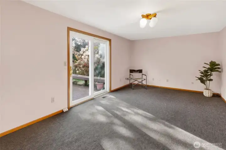 A separate family room is located directly behind the living room, it offers access to the back yard.