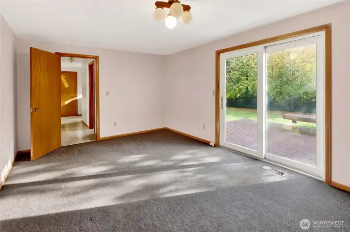 Looking toward the hallway to the 3/4 bath and laundry room.