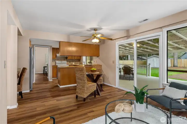 Family room has access to the back covered deck.