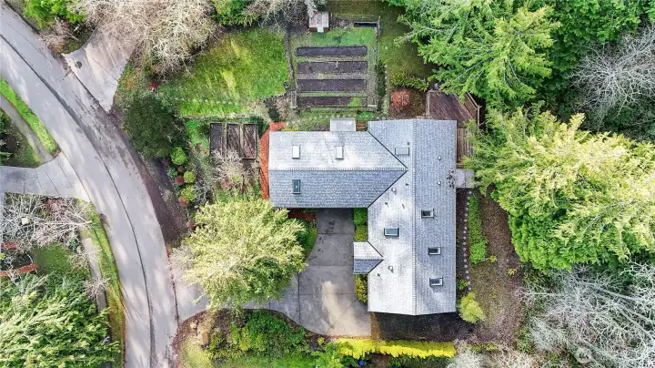 2 tax parcels boasting privacy, garden beds & privacy.