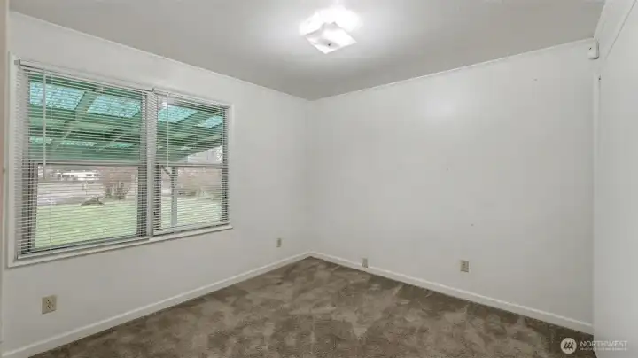 Bedroom 2 facing the backyard
